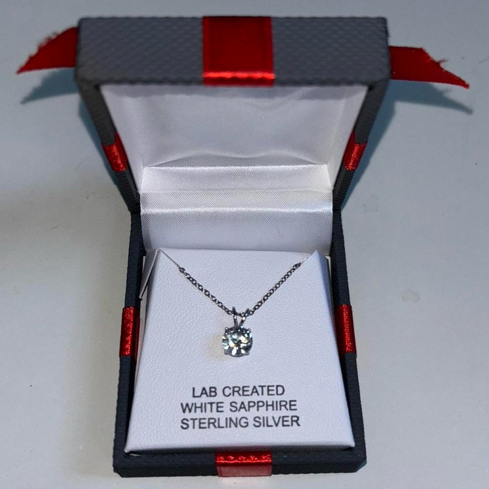 Sterling silver diamond lab created white sapphire necklace
